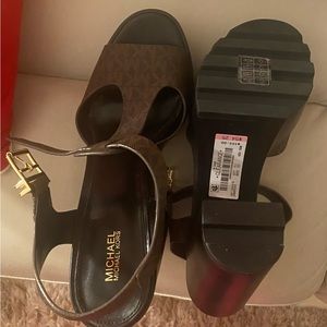 Size 10 Michael Kors shoes. Never worn- purchased from Dillards.